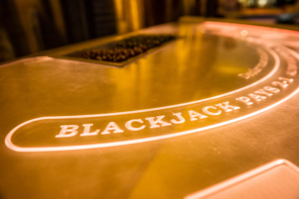 Illuminated blackjack table.