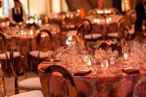 Our event designer opted for a Golden Gate-inspired color palette for a formal seated dinner. Photo courtesy of AlliedPRA. 