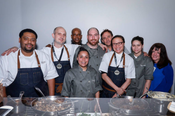 From left to right: Dontaye Ball, Tasting Chef; Aaron Zimmer, Executive Chef; Teddy Legasse, Equipment Manager; Ursila Martinez, Executive Event Sous Chef; Jacob Zimmer, line cook; Scott Fairbanks, Creative Director; Michelle Kohm, Chef de Cuisine; Mia Parker, line cook; Laura Lyons, CEO. 